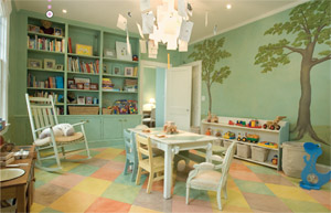 The children's playroom features hand-painted wall murals and a hand-painted border on the hardwood floor (photo by Tom Grimes).